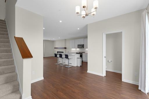 Open-concept main level with durable flooring, recessed lighting, and plenty of room for everyday living and entertaining.