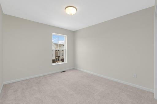 Additional 3rd upper-level bedroom with space for guests, family, or a home office.