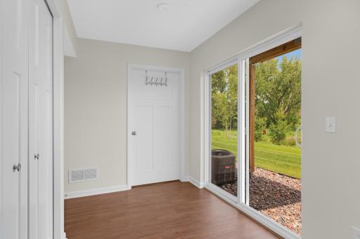 The walkout lower level opens to the backyard, creating additional outdoor living opportunities and convenient access to the surrounding green space.