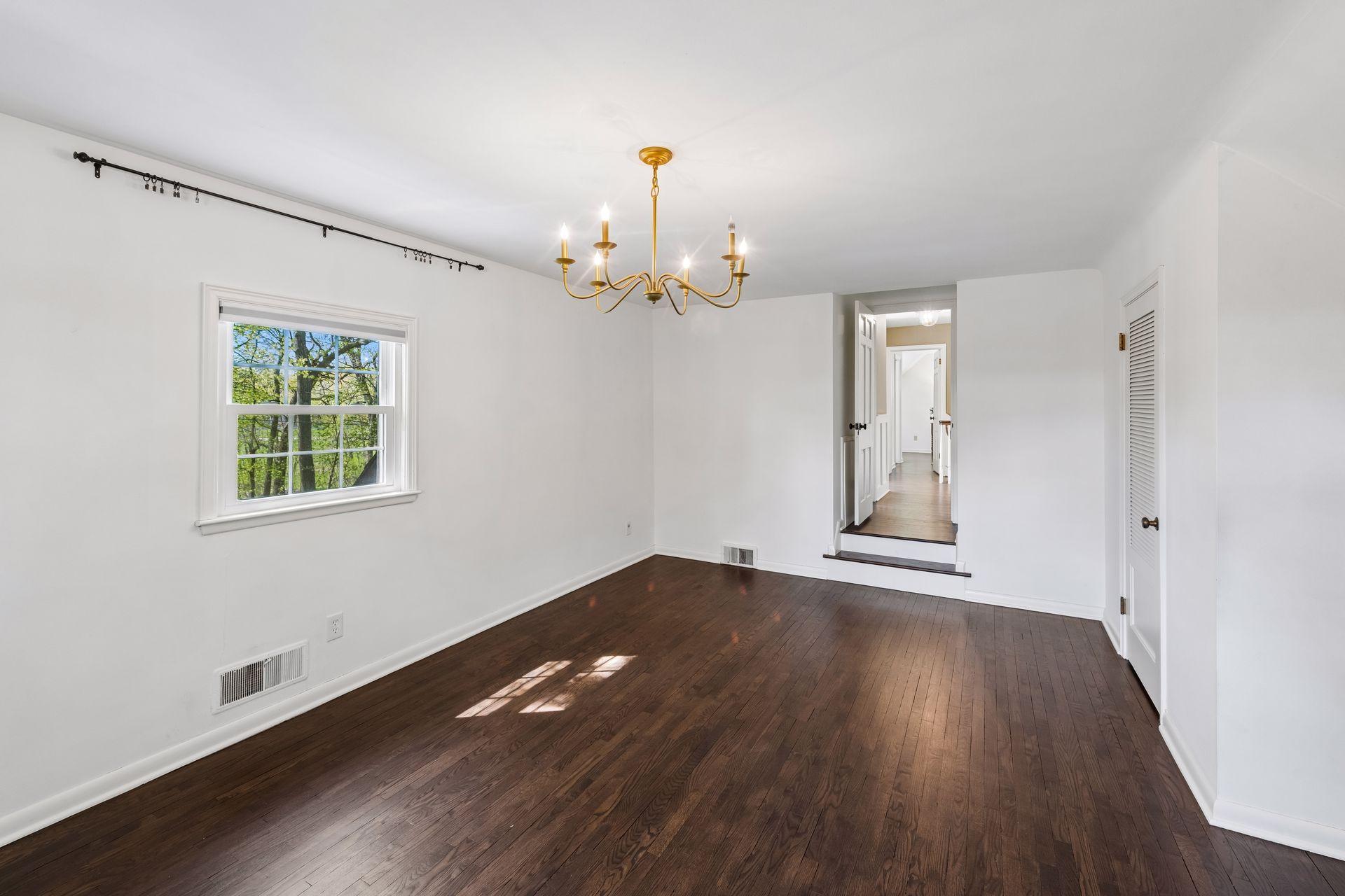 Third upper-level bedroom with two closets