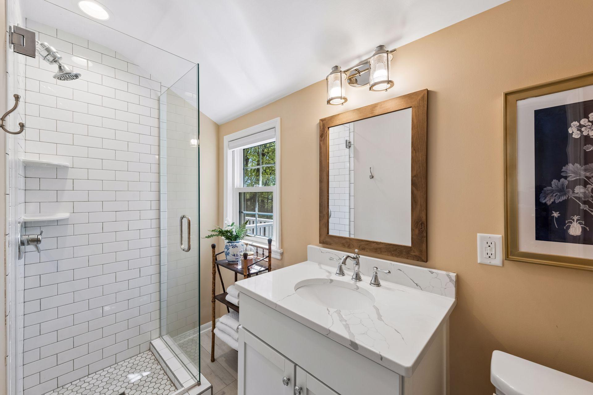 Primary bathroom with tiled walk-in shower