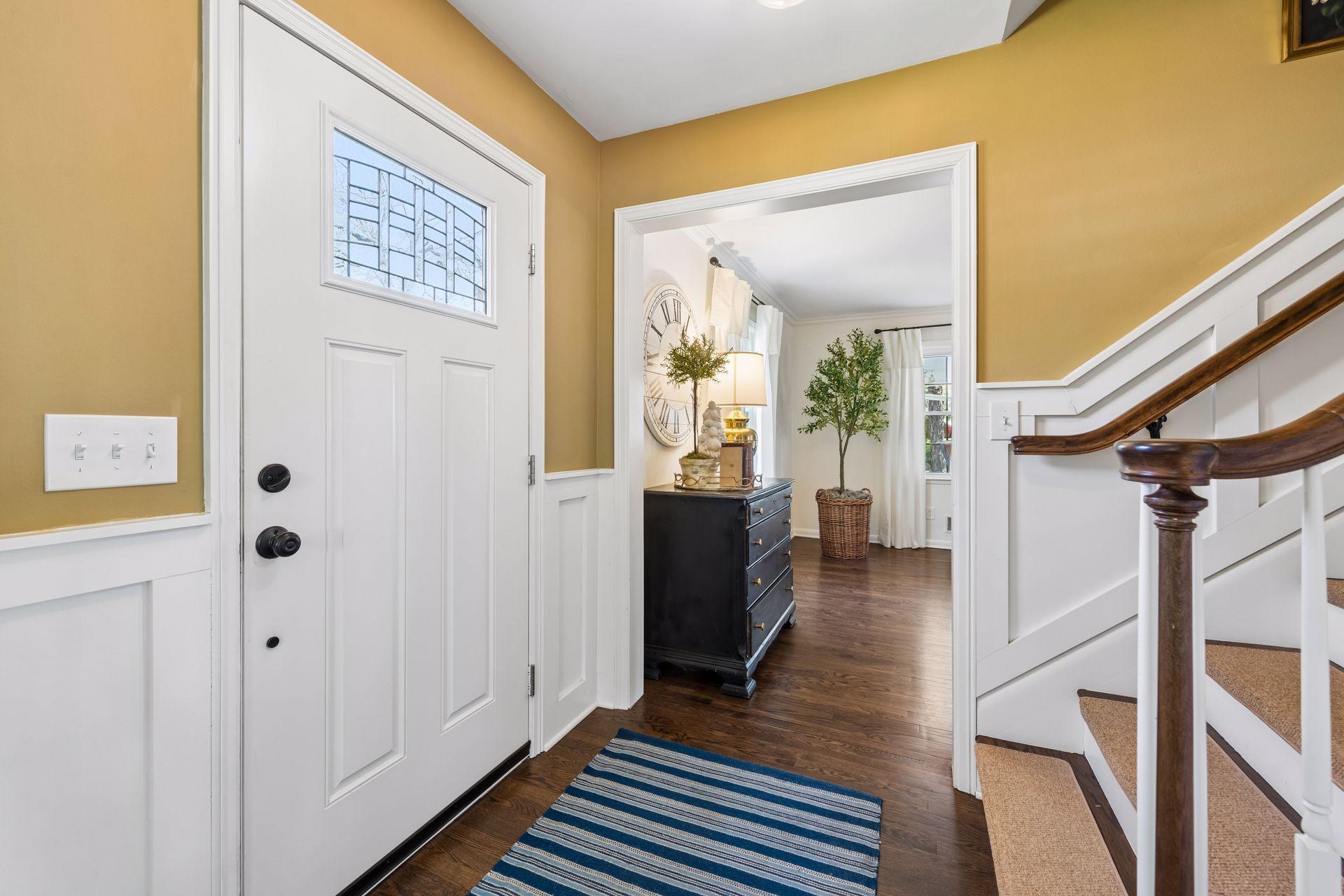 Front entry with the family room one side and the dining room on the other