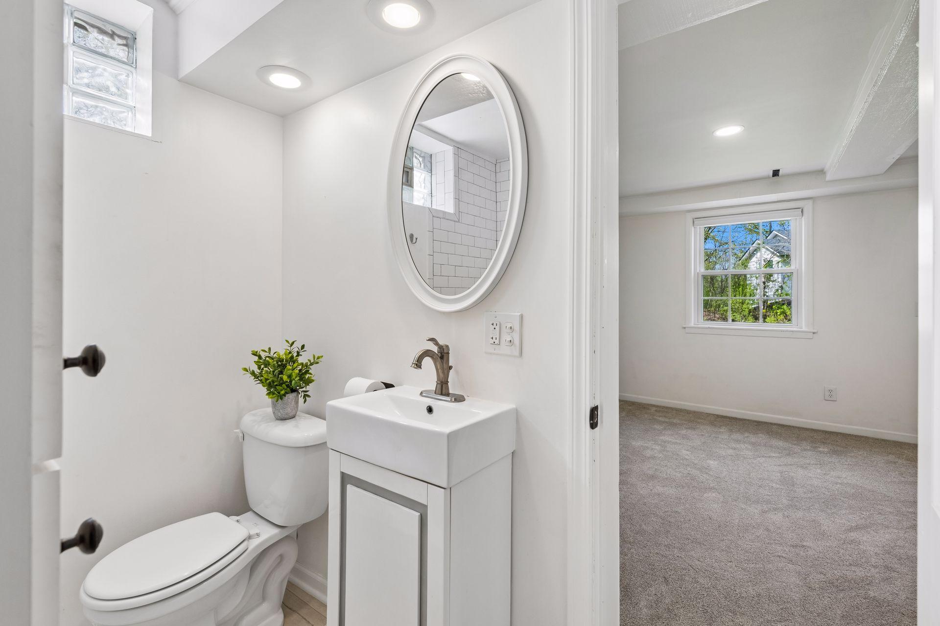 Lower-level bathroom with tiled walk-in shower