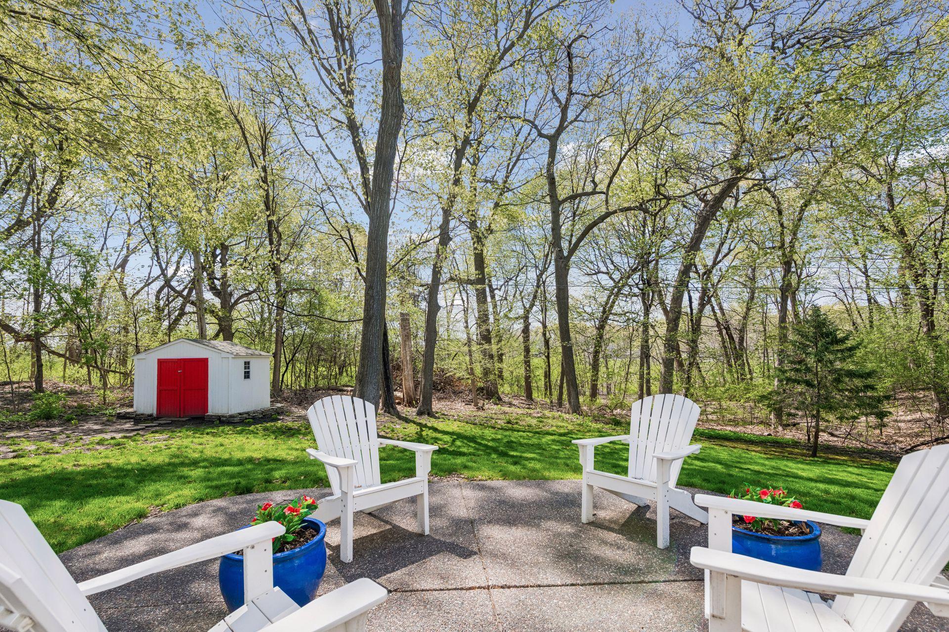 The back patio overlooks the backyard