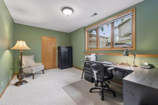 The third bedroom features a large walk-in closet. Currently used as an office and could also serve as a craft or hobby room.