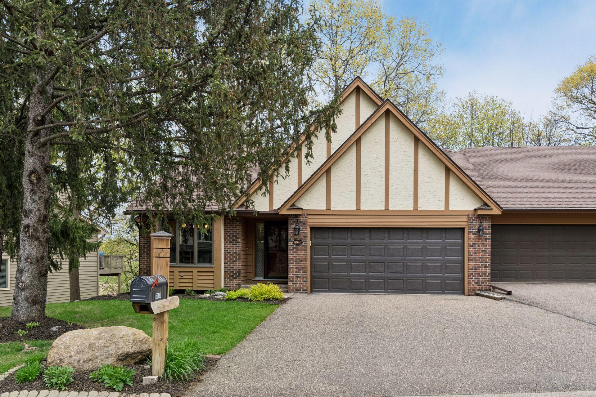 Welcome to 6843 Stonewood Court! Nestled on a premium wooded lot, this home offers privacy, mature trees, and strong curb appeal in a quiet Eden Prairie setting.