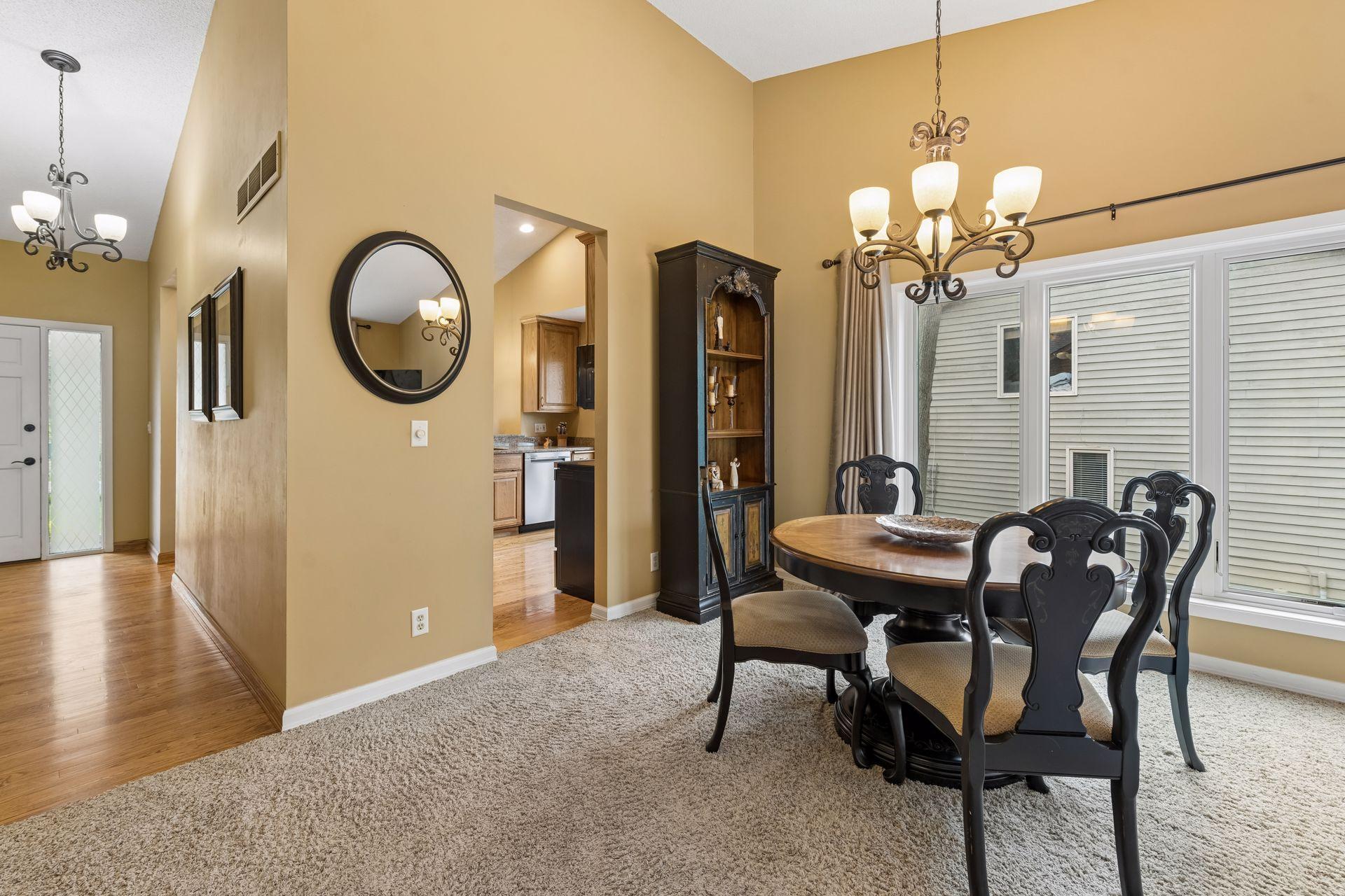 Comfortable dining space with timeless appeal and natural light.