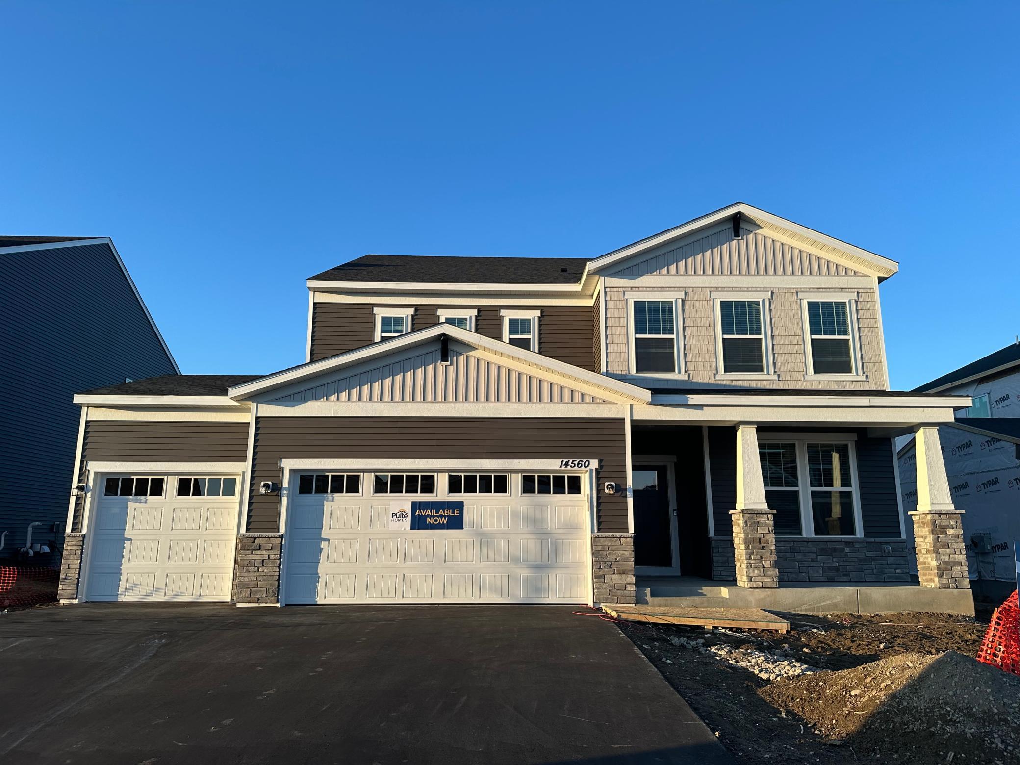 Exterior elevation with front porch- landscaping/irrigation included