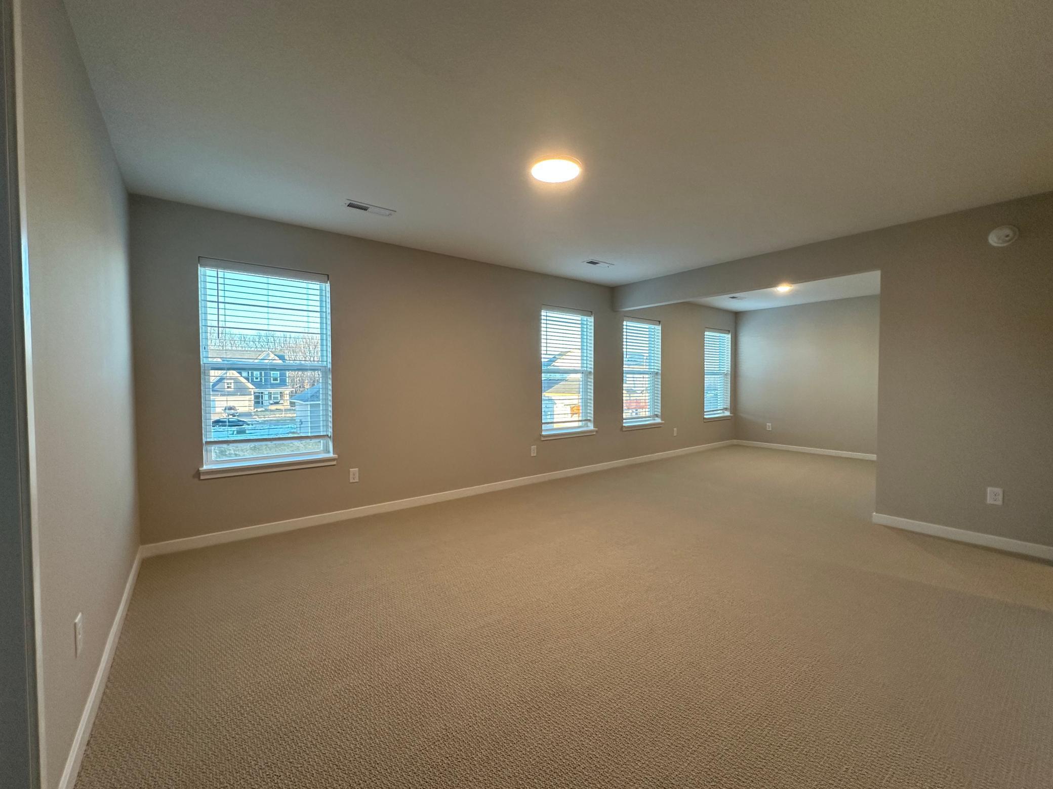 Spacious primary suite with owner's retreat