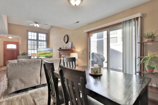 Dining area is easily accessed by both living room and kitchen.