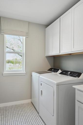 Laundry Room with Built In Cabinets And Sink