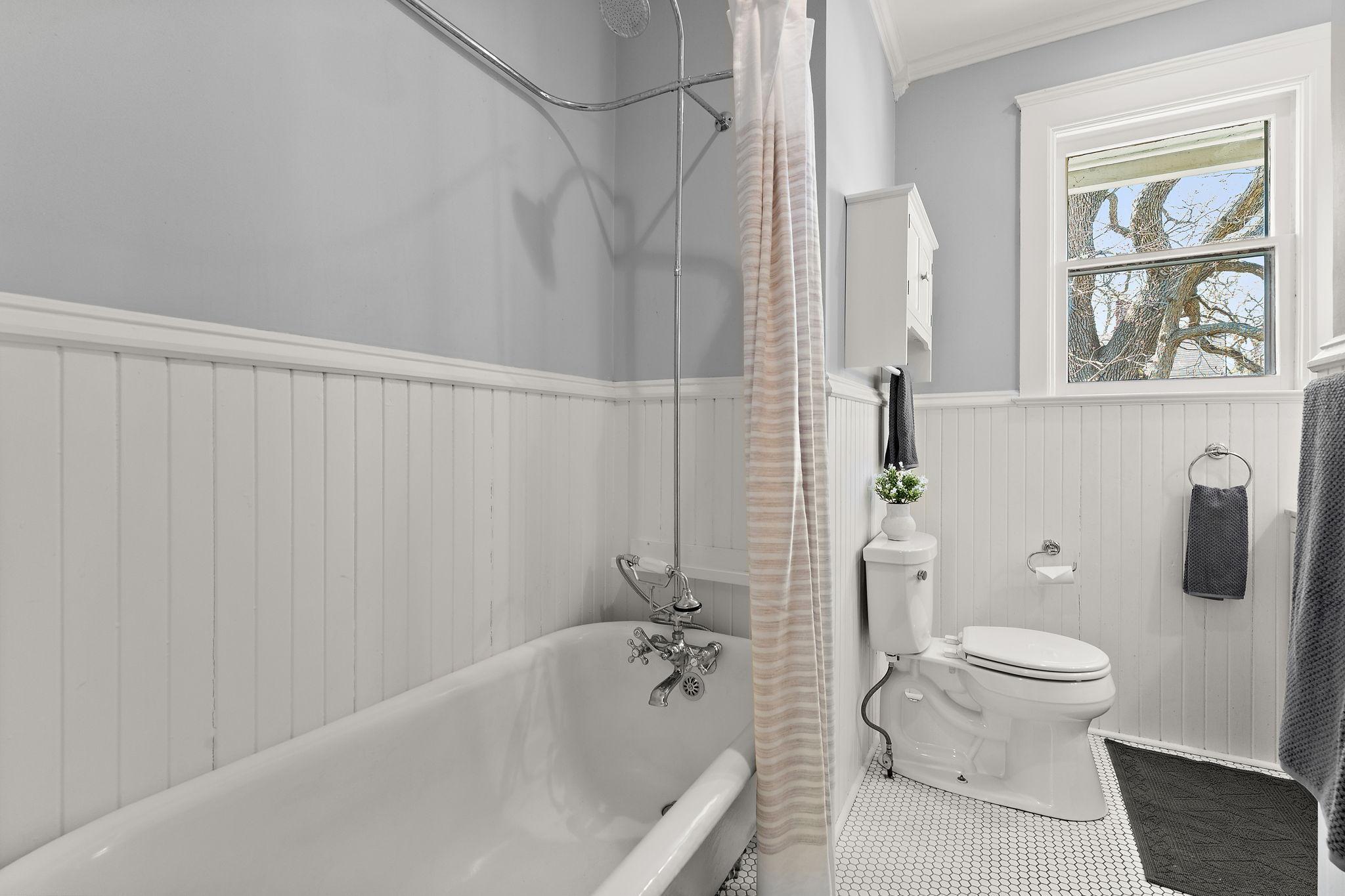 Lovely clawfoot tub in the updated full bathroom