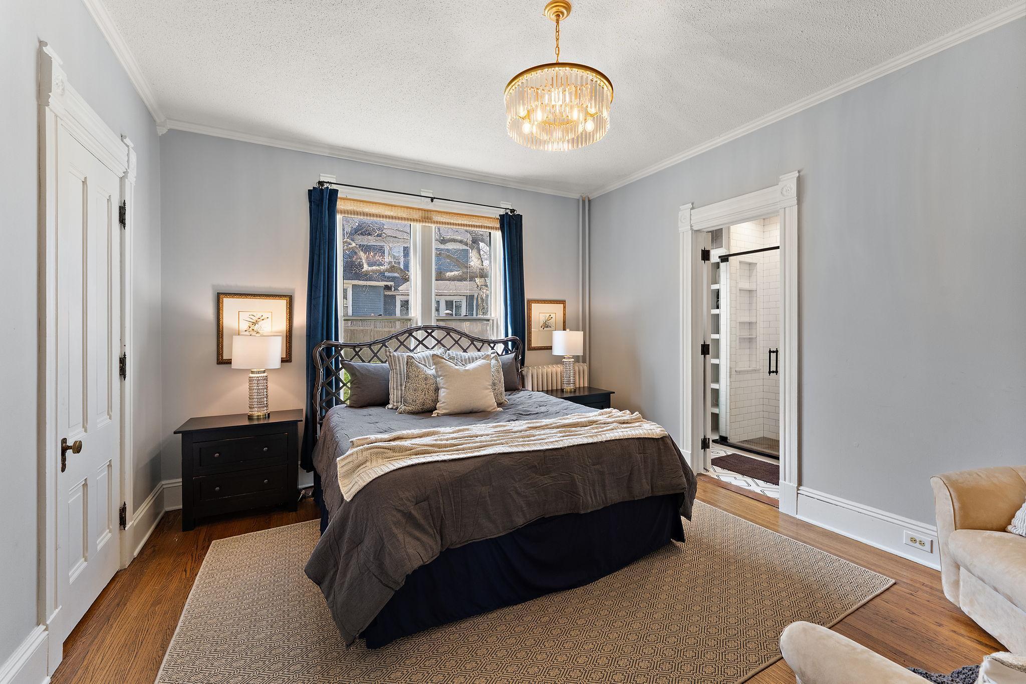 Main level bedroom suite with a huge closet and attached bath