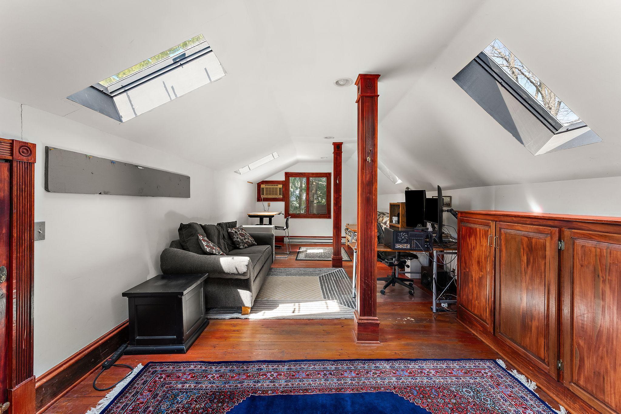 Bonus finished space over the garage, perfect for a home office or studio