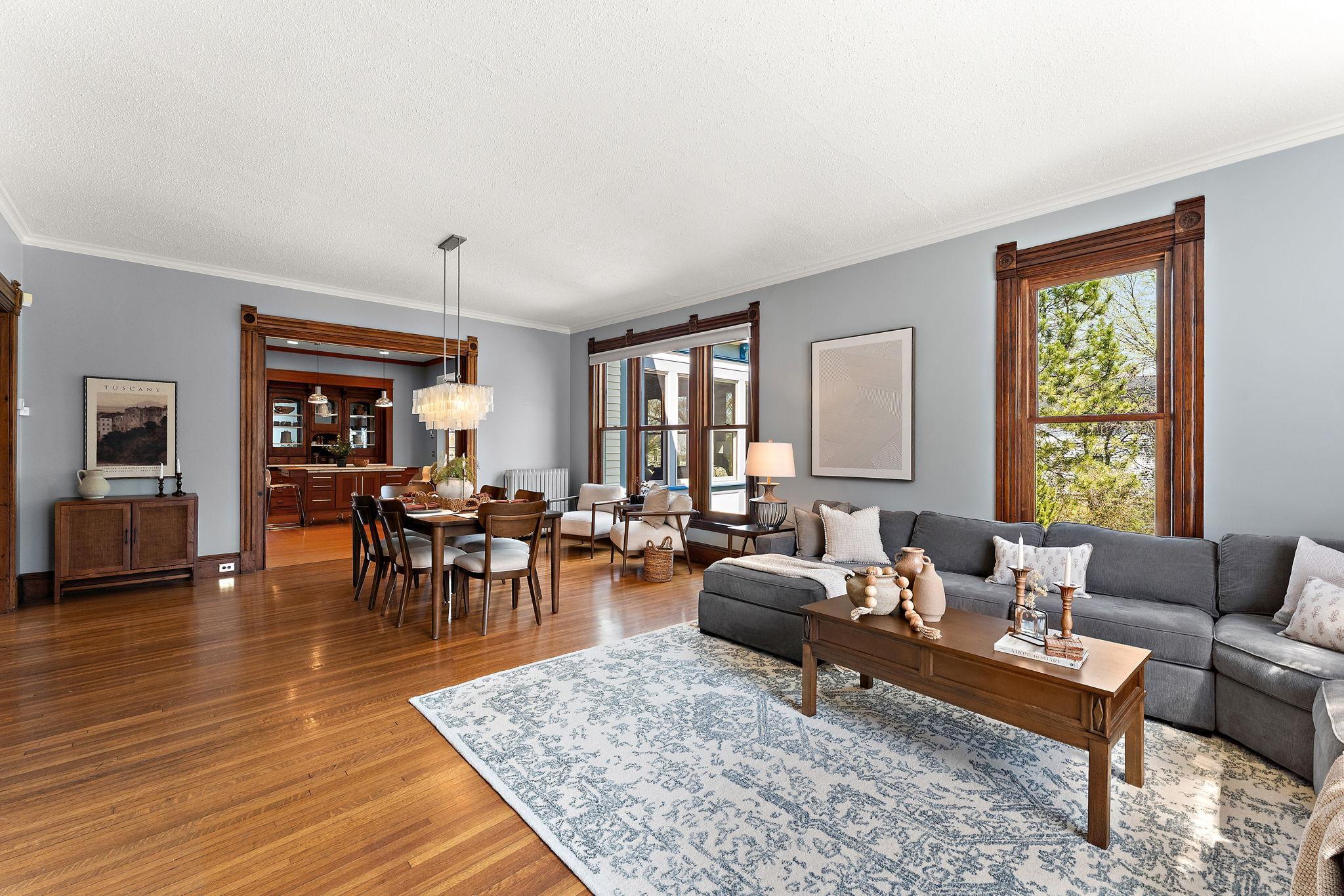 High ceilings, gleaming floors and three new east facing living room windows