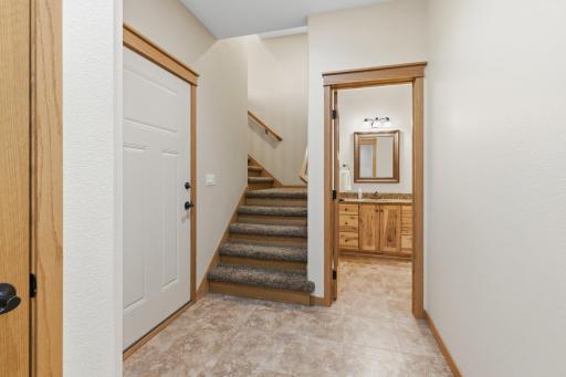 Door to Garage and Steps to Bonus Room Upstairs.jpg