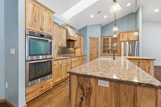Beautiful Kitchen with Granite Counters and Hickory Cabinets.jpg