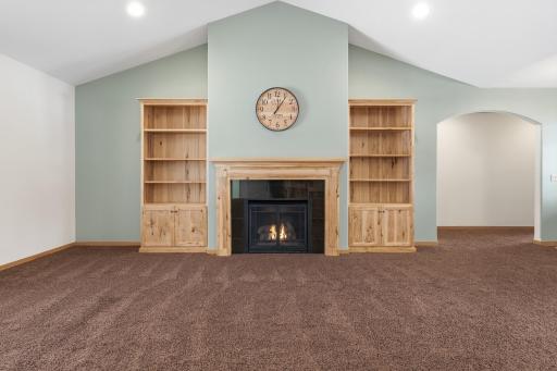 Beautiful Living Room with Vaulted Ceiling and Gas Fireplace.jpg