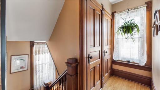 Top of Staircase #2 - Gorgeous original paneled doors and woodwork.