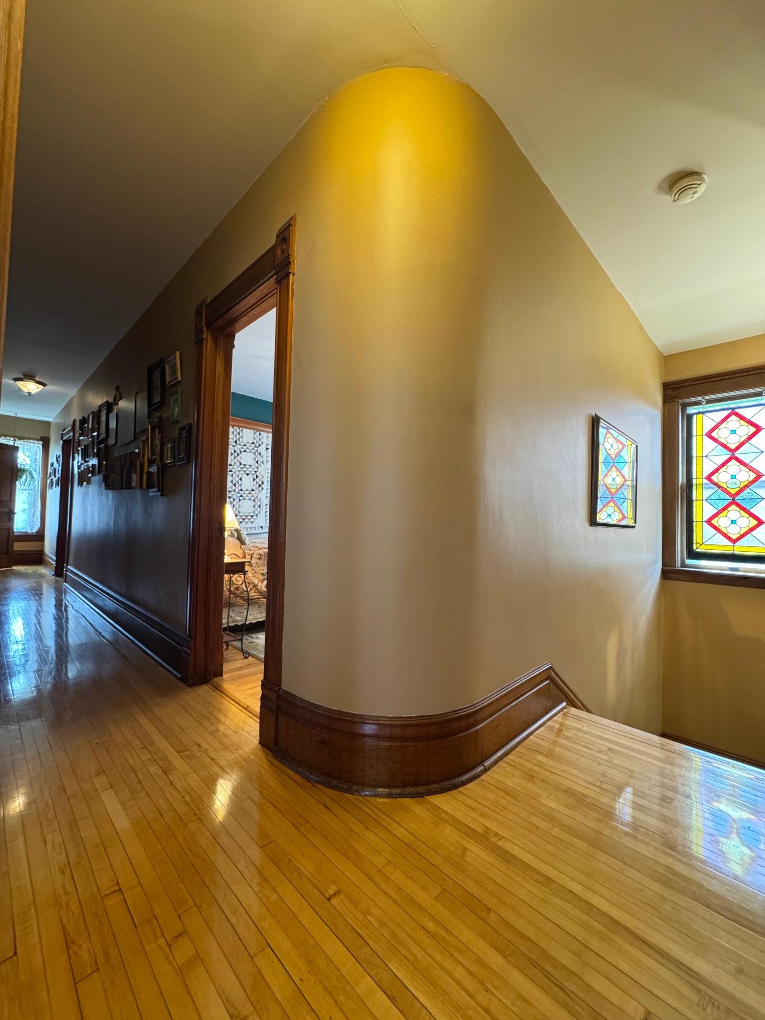 2nd Floor Grand Hallway, original wood flooring