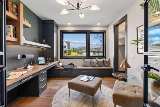 Private main floor office located near the entry and kitchen.