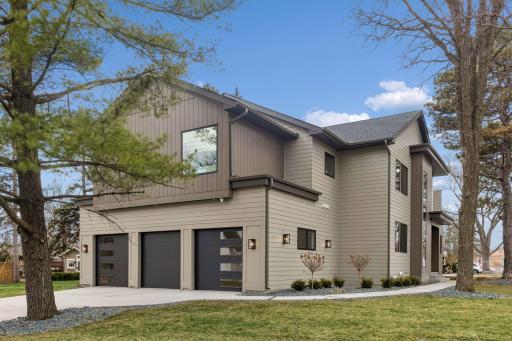 Attached 3 car heated garage (33 x 20) with 3 (8 x 8) doors.