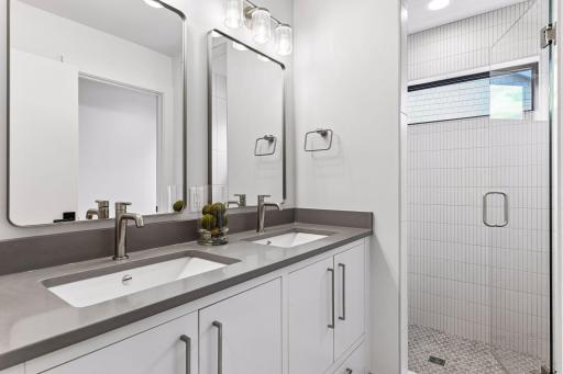 Upper level 3rd bath with double vanity.