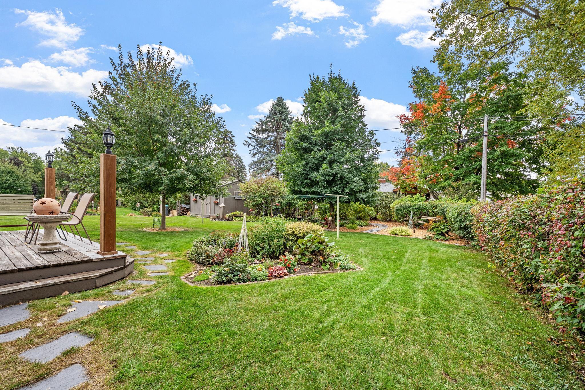 Bocce ball & croquet is fun entertainment with friends & family on this nearly 1/2 acre privacy shrubbed yard