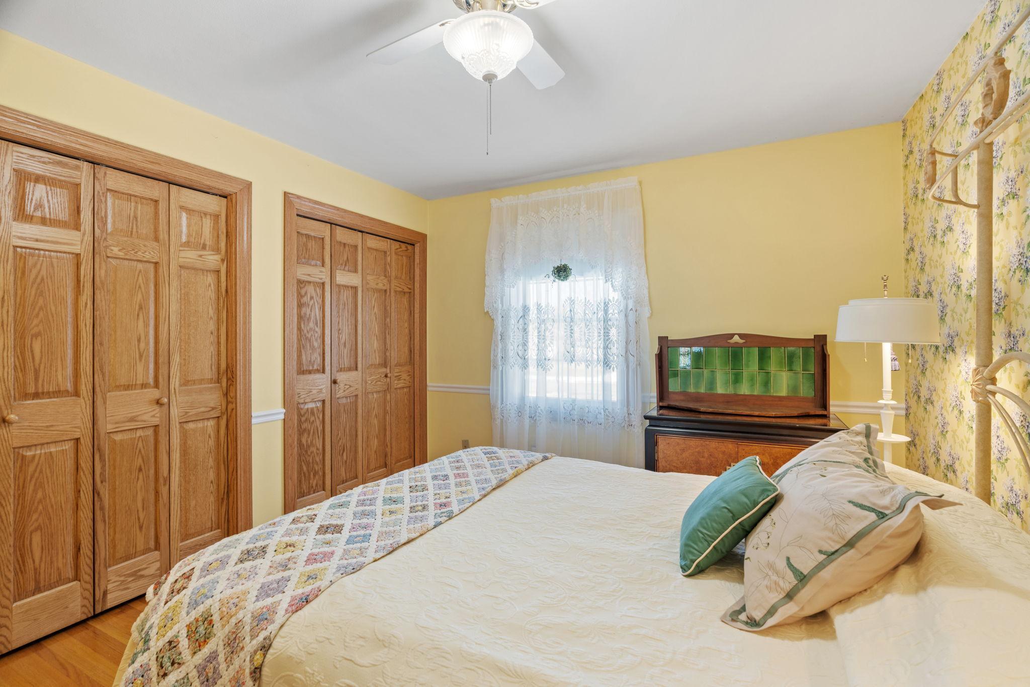Double closets with replaced oak doors