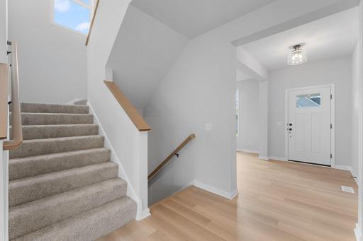 Staircase leading up and to the lower level