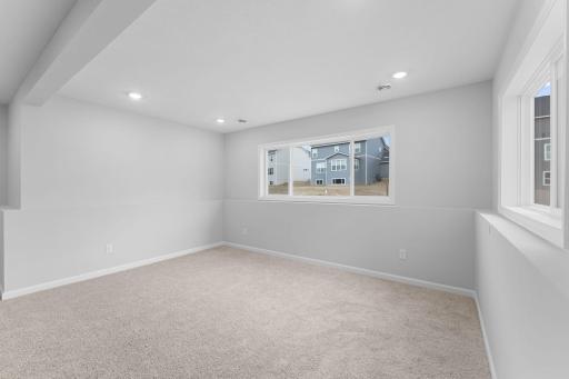 Lower level morning room great for a desk or pool stable