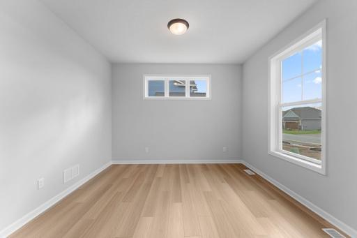 Flex room front of home would make a great home office or reading room