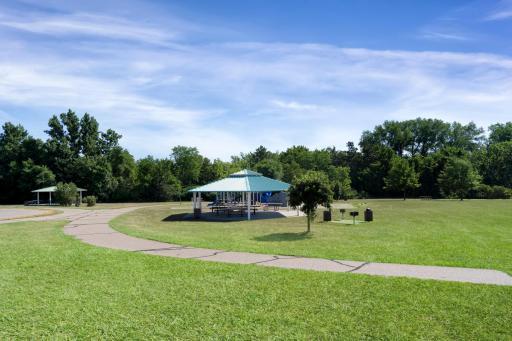 Riverwalk is where dreams are made! Fall in love with the community pool, clubhouse, miles of walking trails, parks, & the Mississippi river just down the street with Cloquet Overlook Park. It's a beautiful blend of city & nature! Slice of Paradise!