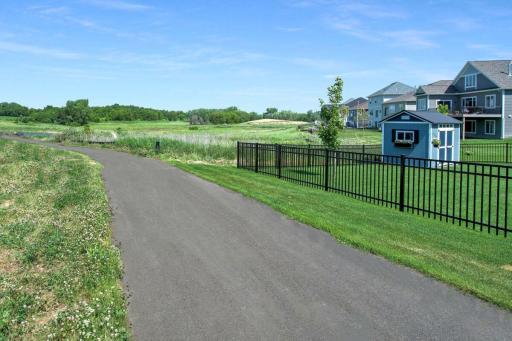 Riverwalk is where dreams are made! Fall in love with the community pool, clubhouse, miles of walking trails, parks, & the Mississippi river just down the street with Cloquet Overlook Park. It's a beautiful blend of city & nature! Slice of Paradise!