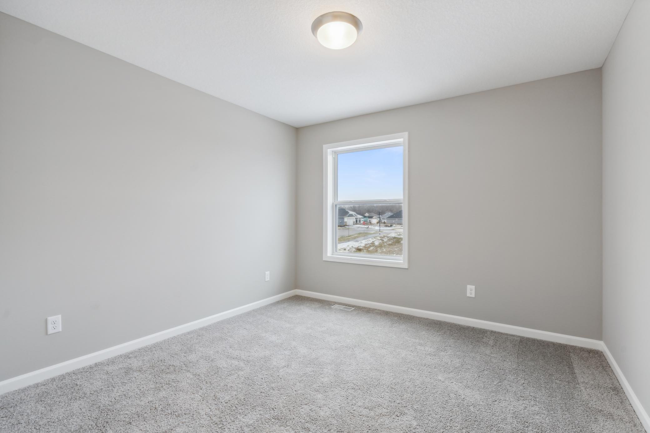 Bedroom #2 *Photo of a previously built home of the same floor plan. Finishes/options may vary.