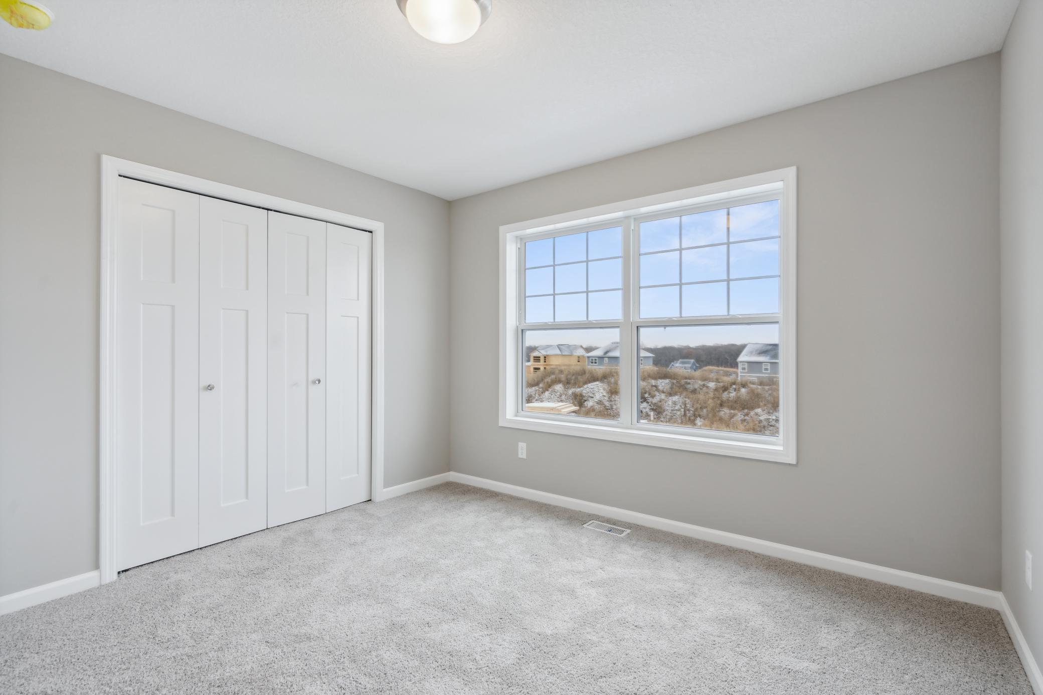 Bedroom #3 *Photo of a previously built home of the same floor plan. Finishes/options may vary.