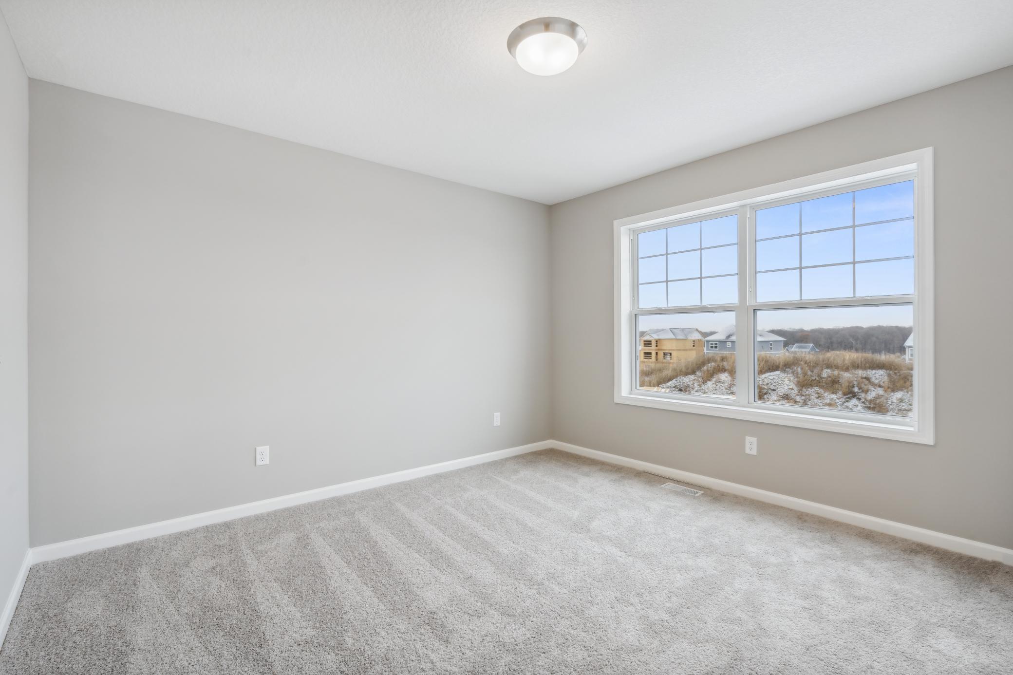 Bedroom #4 *Photo of a previously built home of the same floor plan. Finishes/options may vary.