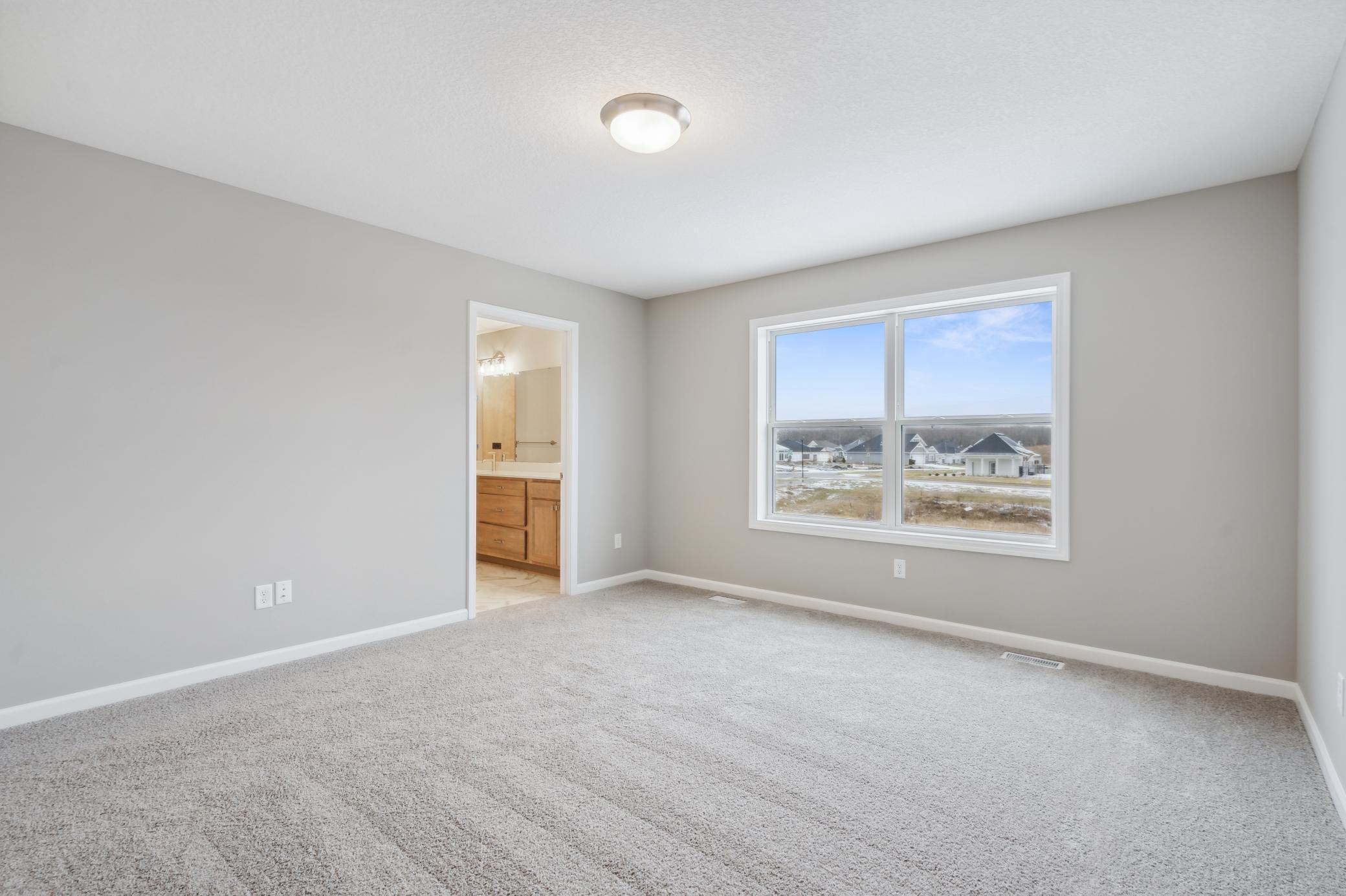 Owner's Suite *Photo of a previously built home of the same floor plan. Finishes/options may vary.