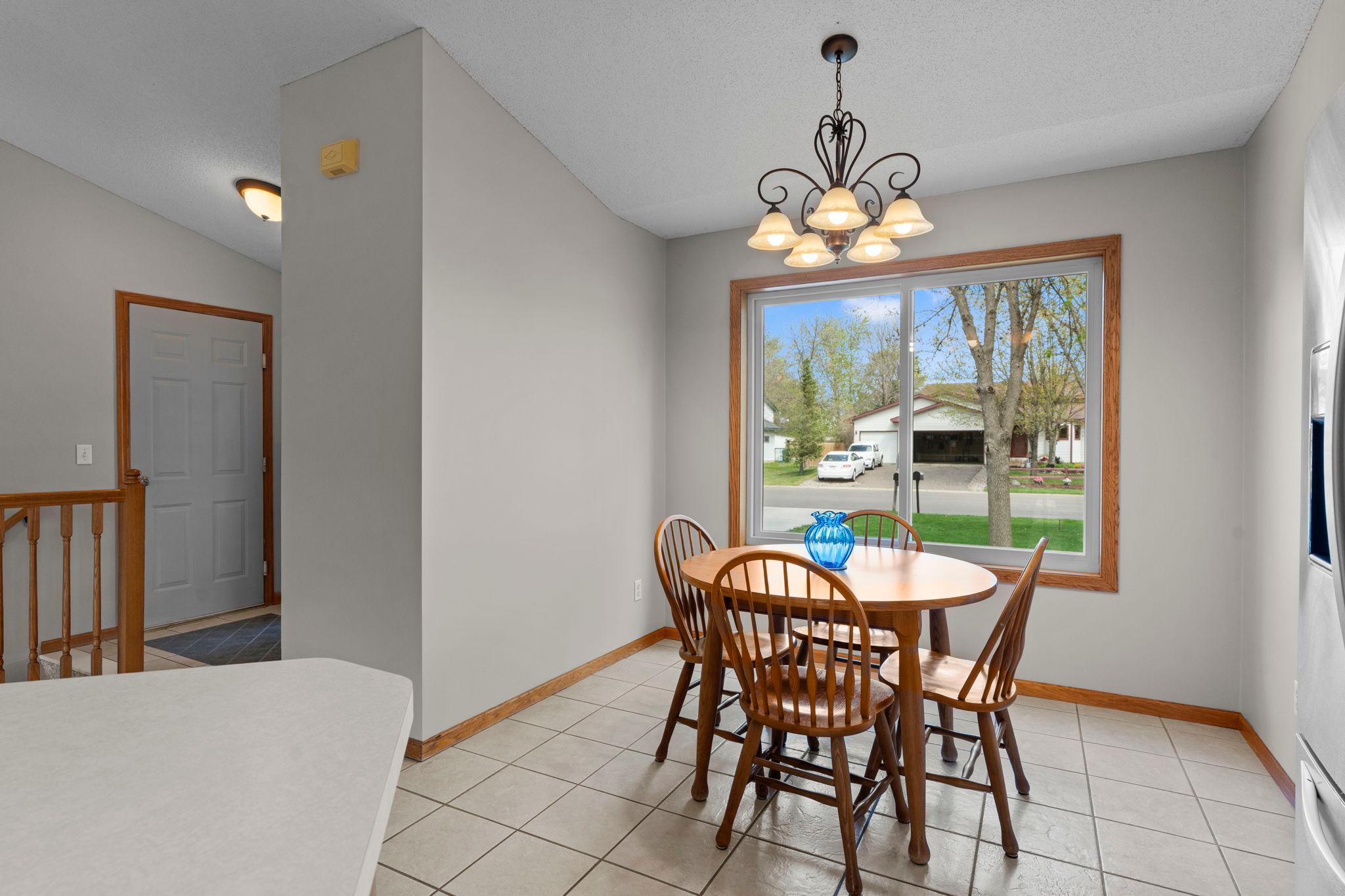 Eat in kitchen just off entry with large windows