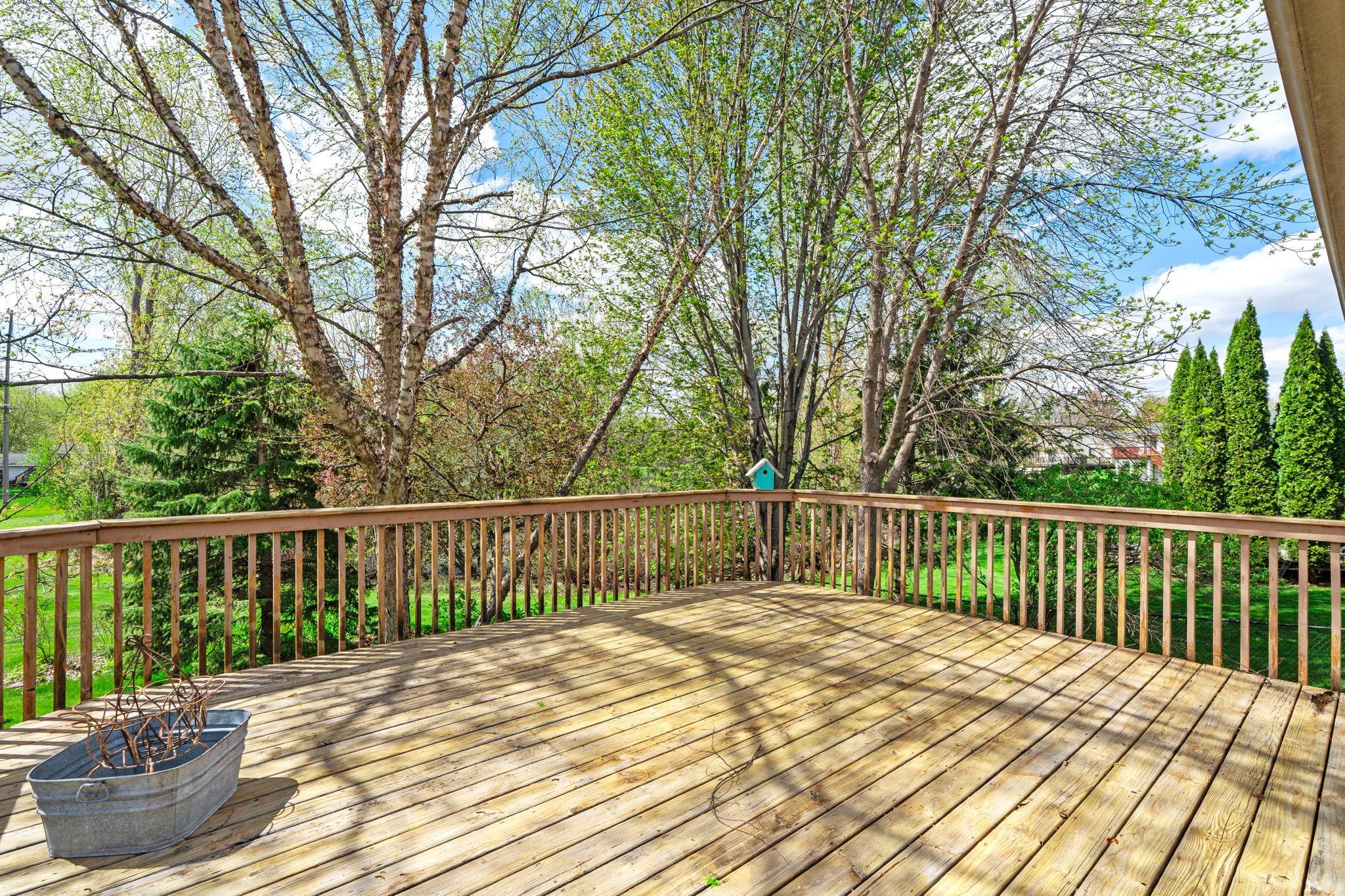 Large deck with stairs off upper level