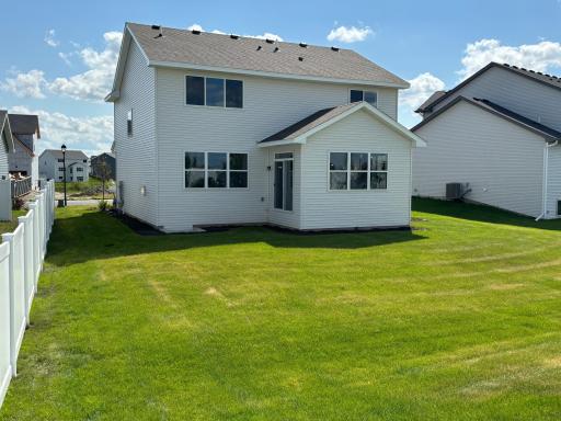 Architecturally designed rear elevation with excellent indoor-outdoor access off of the charming Morning Room.