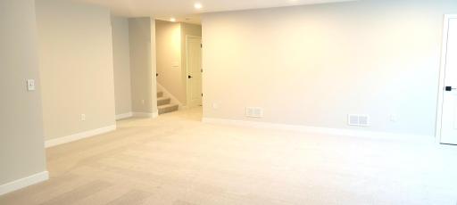Thoughtfully finished basement with multiple functional living zones