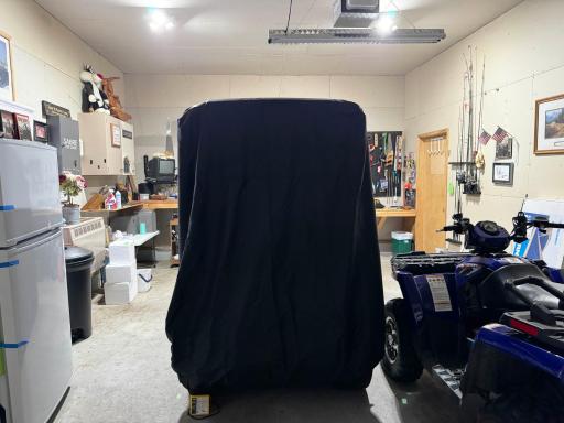 A look inside the finished heated/insulated detached garage "shop" stall.