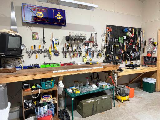 A closer look at the workshop space in the first partition of the garage.