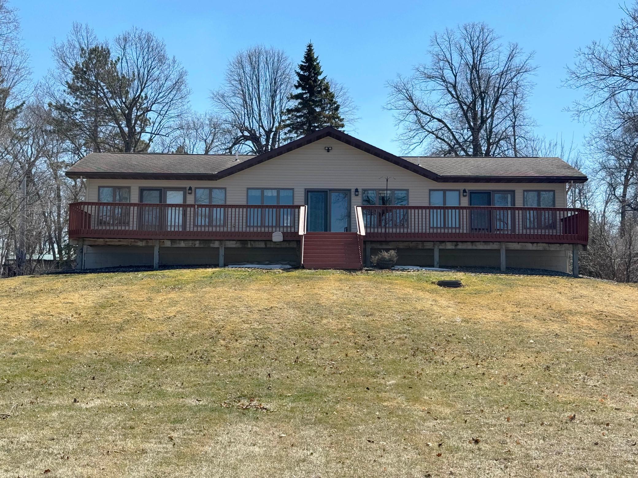 Another angle of the home's exterior with the lakeshore at your back...the gentlest of slopes to the lake brings you to the crystal clear waters of MilleLacs!