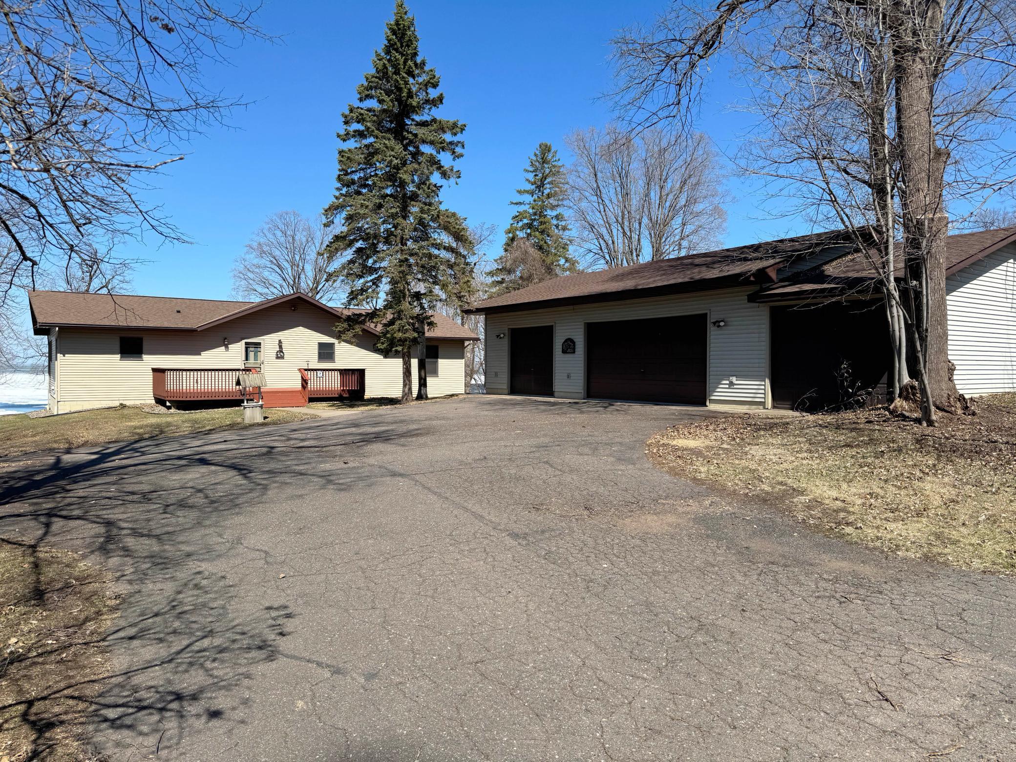 One more shot of the home and garage from the edge of the driveway.