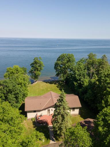 An aerial shot of the property with the lake beyond.