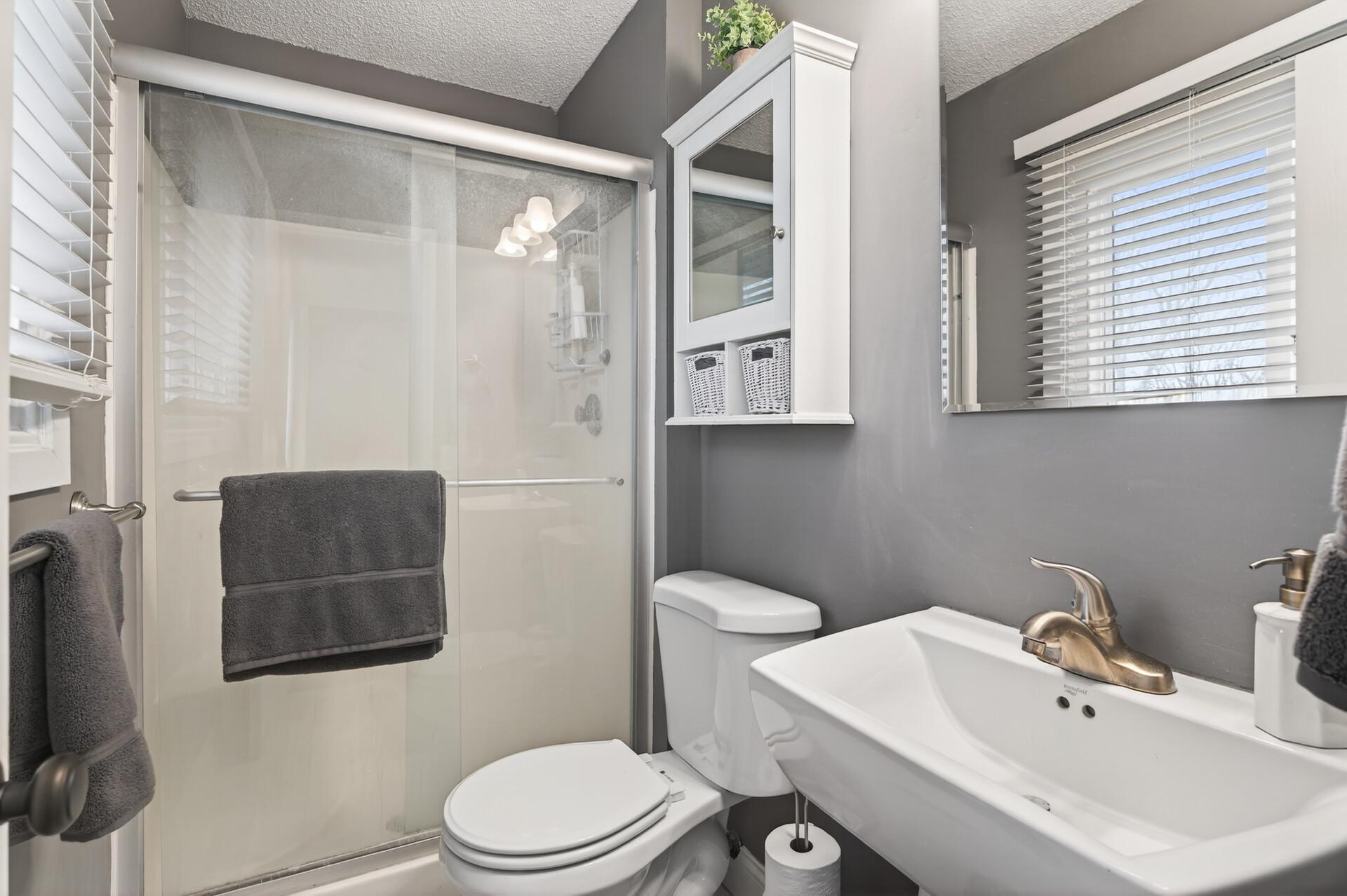 Three bathrooms provide comfort and flexibility for a busy household.