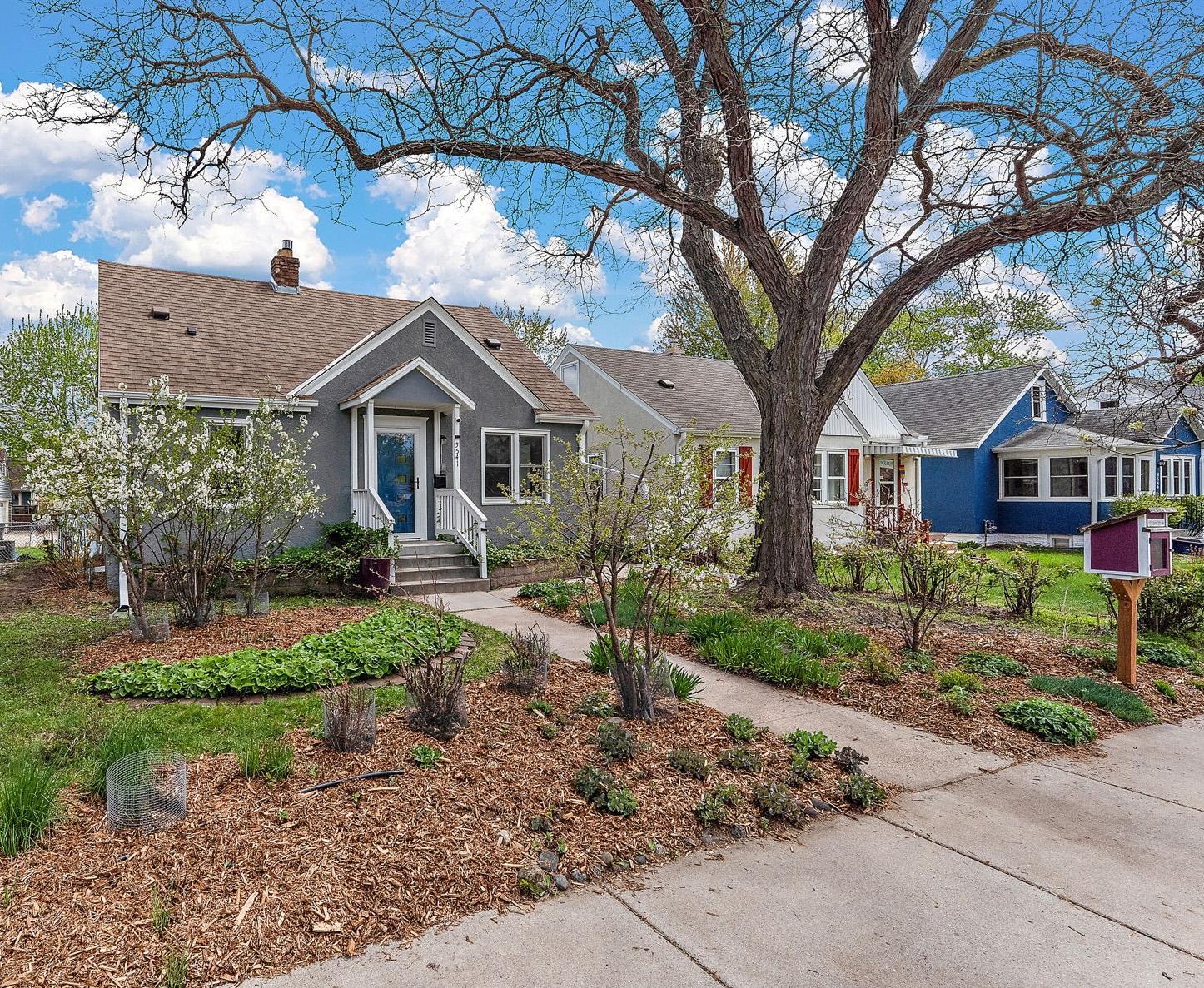Now this is curb appeal! Organically-grown and lovingly-maintained landscaping.