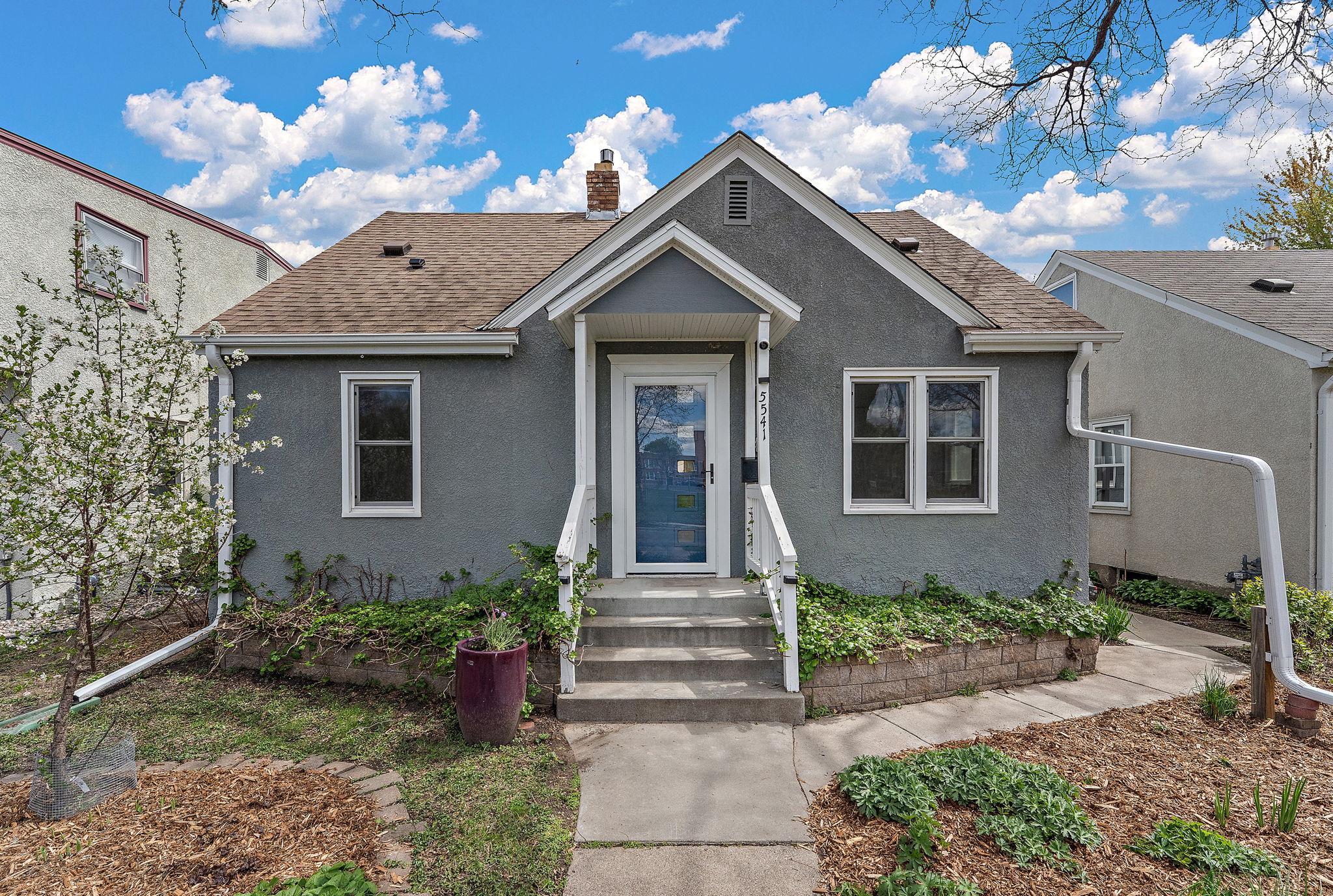Book your showing today! (Note the climbing hydrangea planted along the front on either side of the main door — gorgeous when they bloom!)